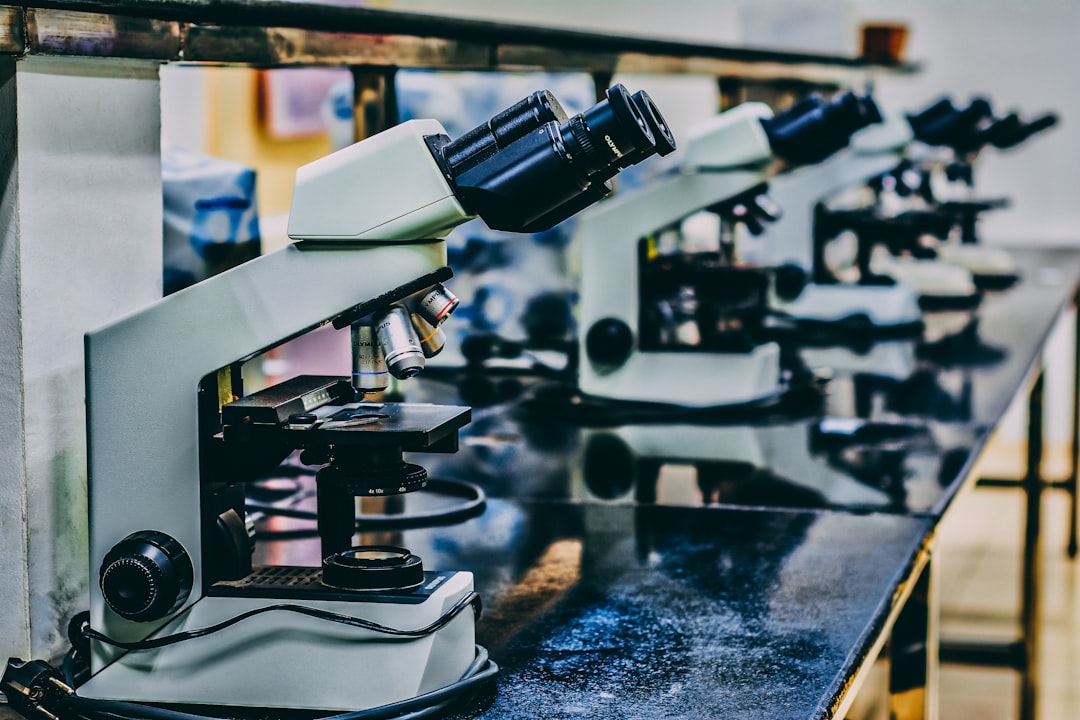 Research microscope representing experimental evidence